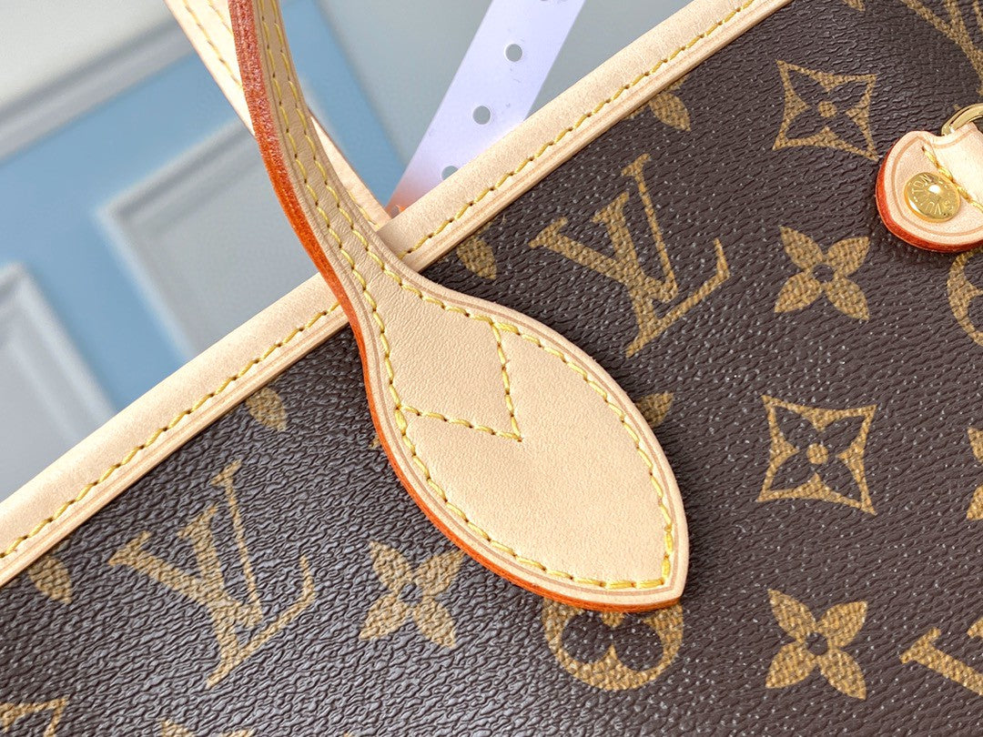 ** Elegant Duty-Free M41177 Handbag with Cherry Red Lining

**