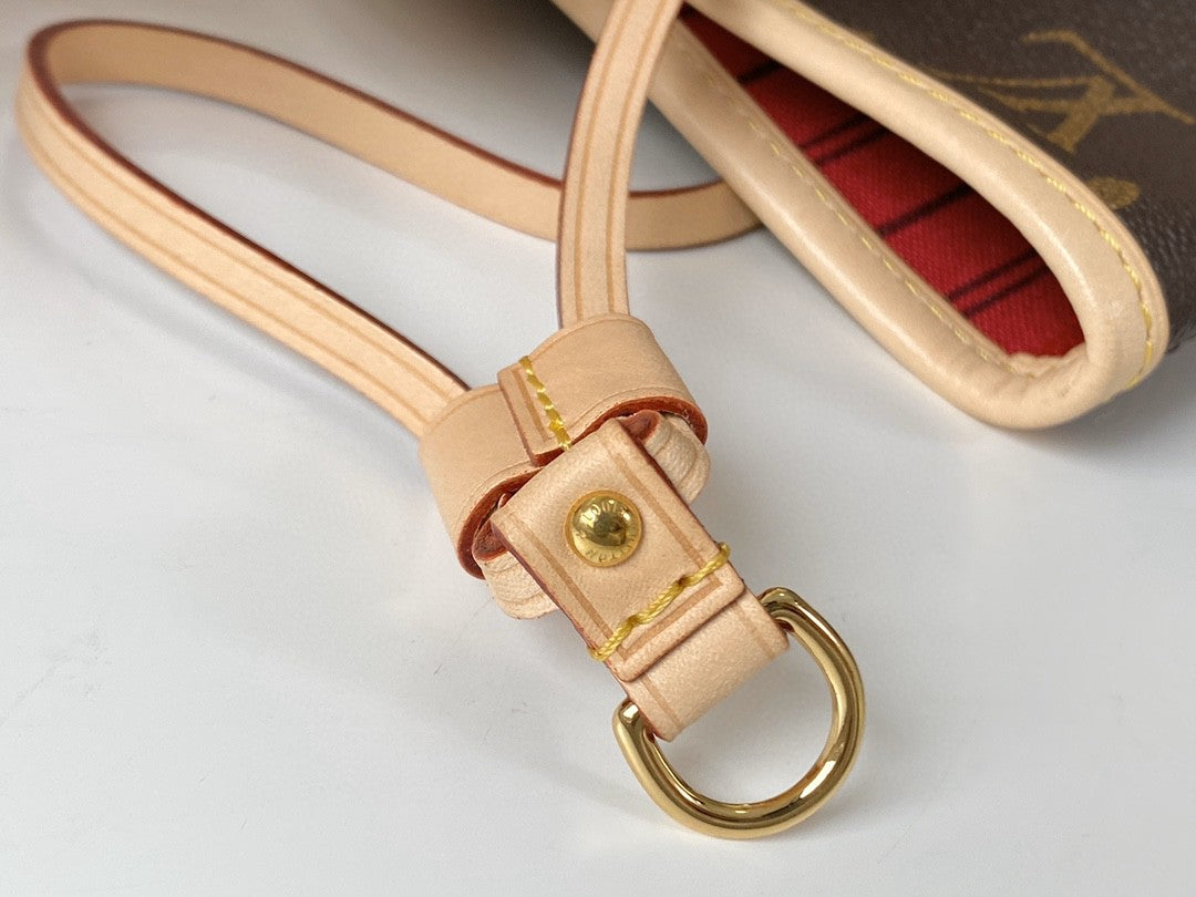 ** Elegant Duty-Free M41177 Handbag with Cherry Red Lining

**