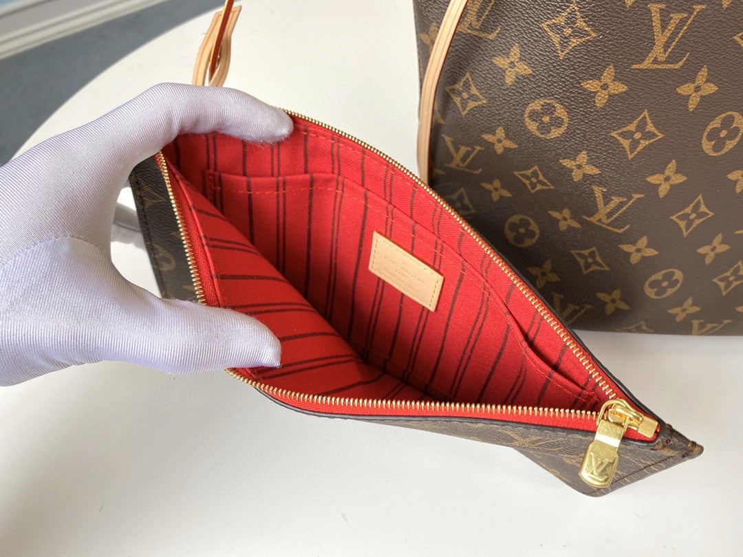 ** Elegant Duty-Free M41177 Handbag with Cherry Red Lining

**