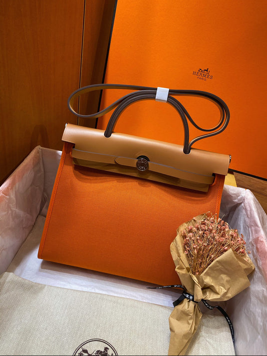 ** Hermes Herbag PM 31cm - Classic Orange & Medium Brown Leather Bag

**