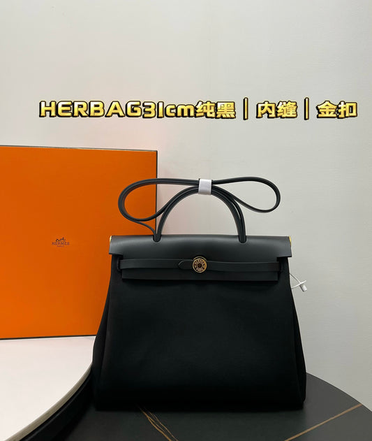 ** Premium Semi-Handmade Herbag 31cm - Pure Black with Gold Buckle

**