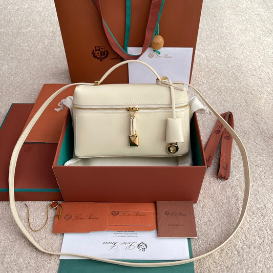 ** Loro Piana Extra Bag L19 – Versatile White Leather Pouch with Gold Hardware

**
