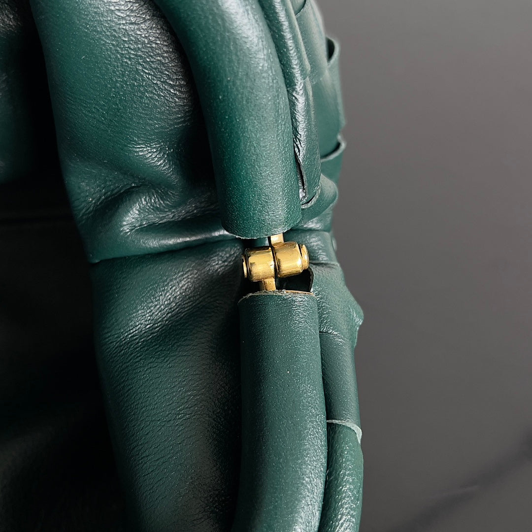 ** Bottega Veneta Emerald Green Pouch - Small Sheepskin Bag

**