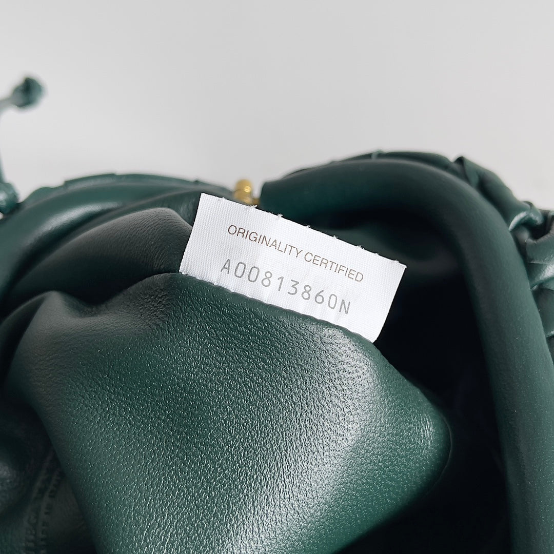 ** Bottega Veneta Emerald Green Pouch - Small Sheepskin Bag

**