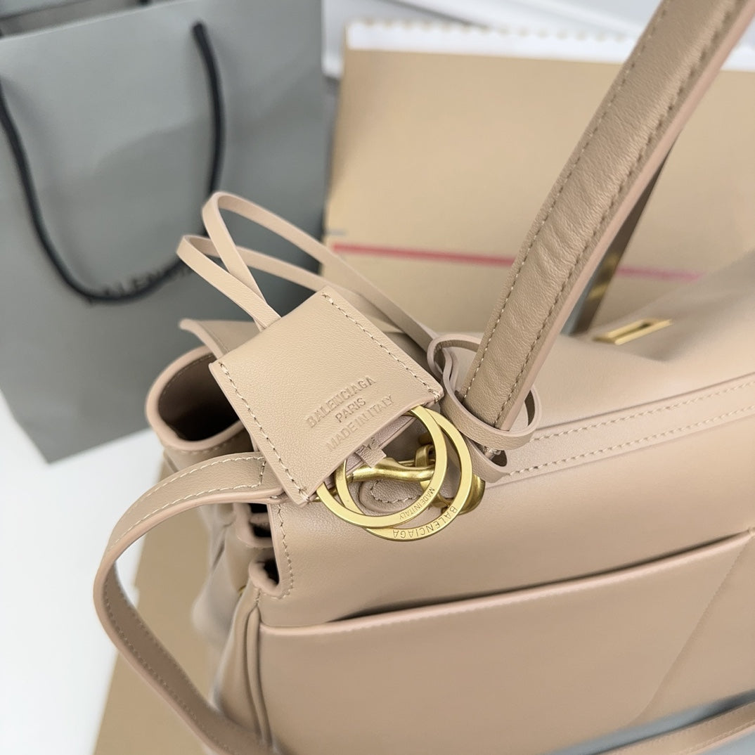 ** Balenciaga Rodeo Bag - Chic Milk Tea Color Handbag with Gold Buckle

**