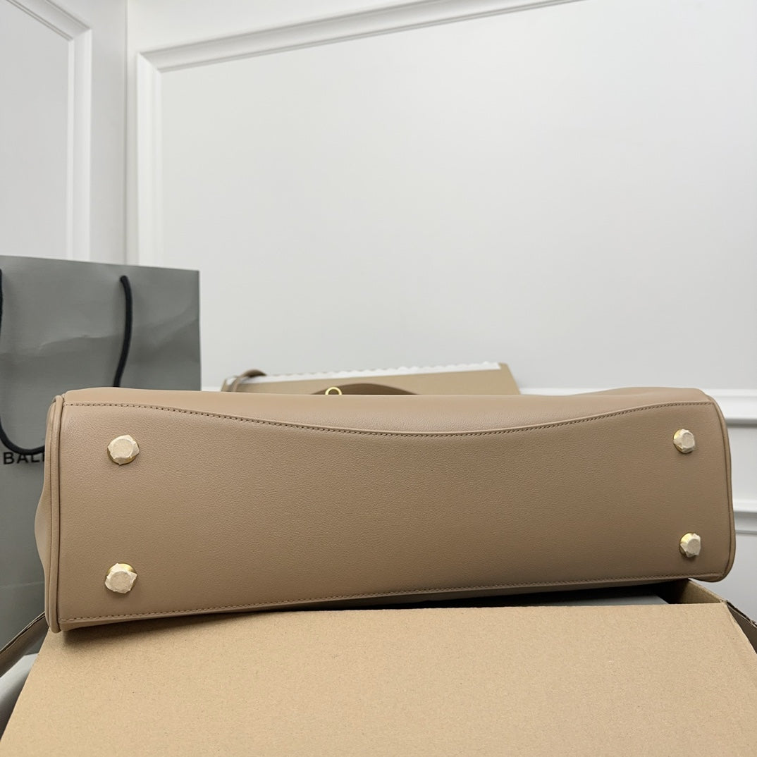 ** Balenciaga Rodeo Bag - Chic Milk Tea Color Handbag with Gold Buckle

**