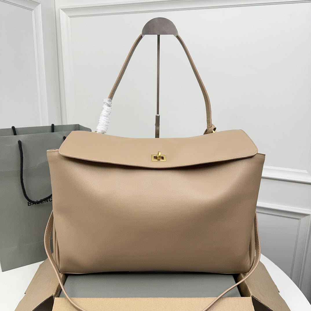 ** Balenciaga Rodeo Bag - Chic Milk Tea Color Handbag with Gold Buckle

**
