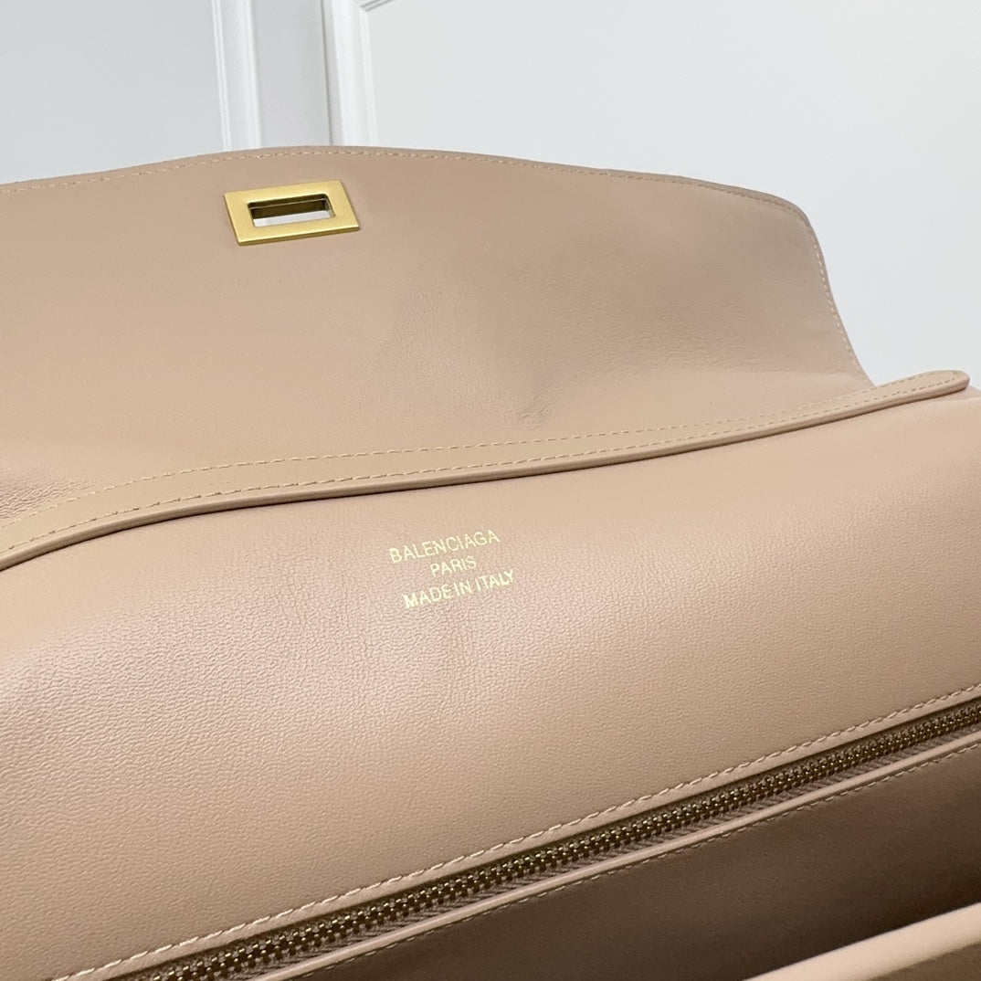 ** Balenciaga Rodeo Bag - Chic Milk Tea Color Handbag with Gold Buckle

**