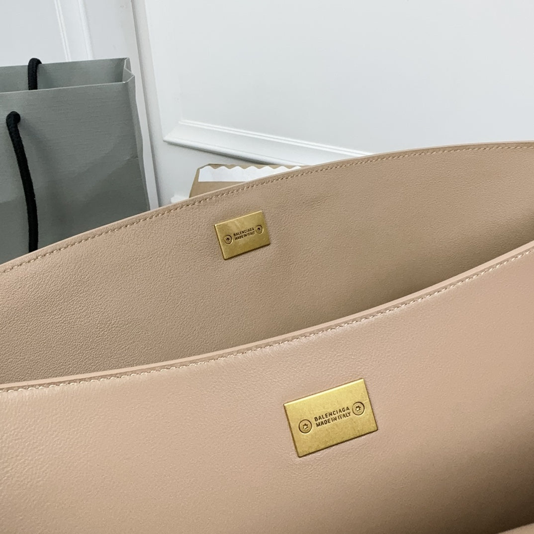 ** Balenciaga Rodeo Bag - Chic Milk Tea Color Handbag with Gold Buckle

**