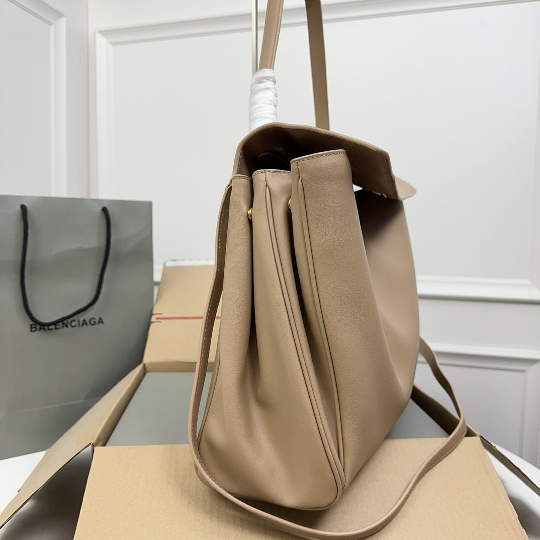 ** Balenciaga Rodeo Bag - Chic Milk Tea Color Handbag with Gold Buckle

**