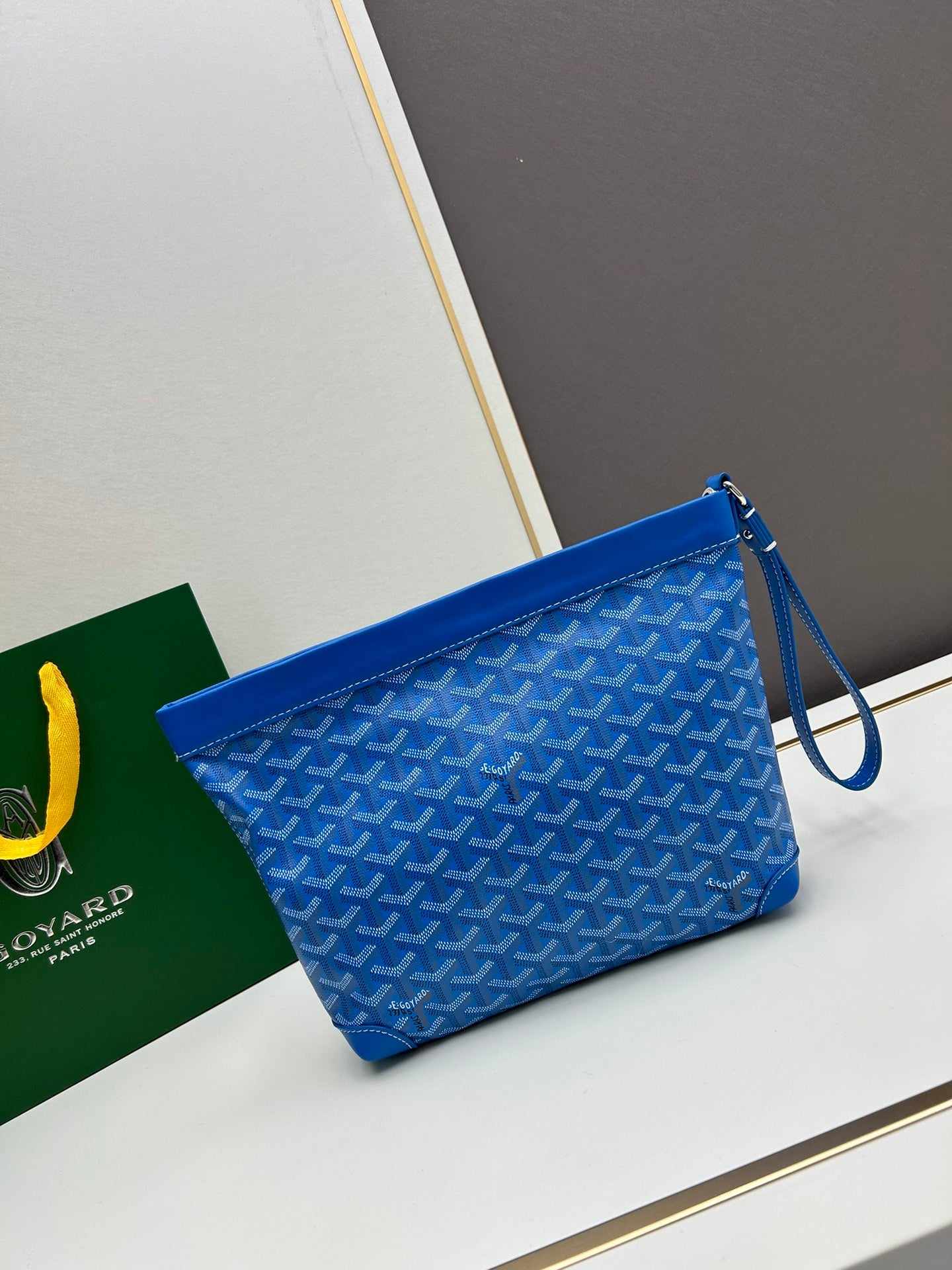 ** Goyard Conti Clutch Bag - Stylish & Practical Essentials

**