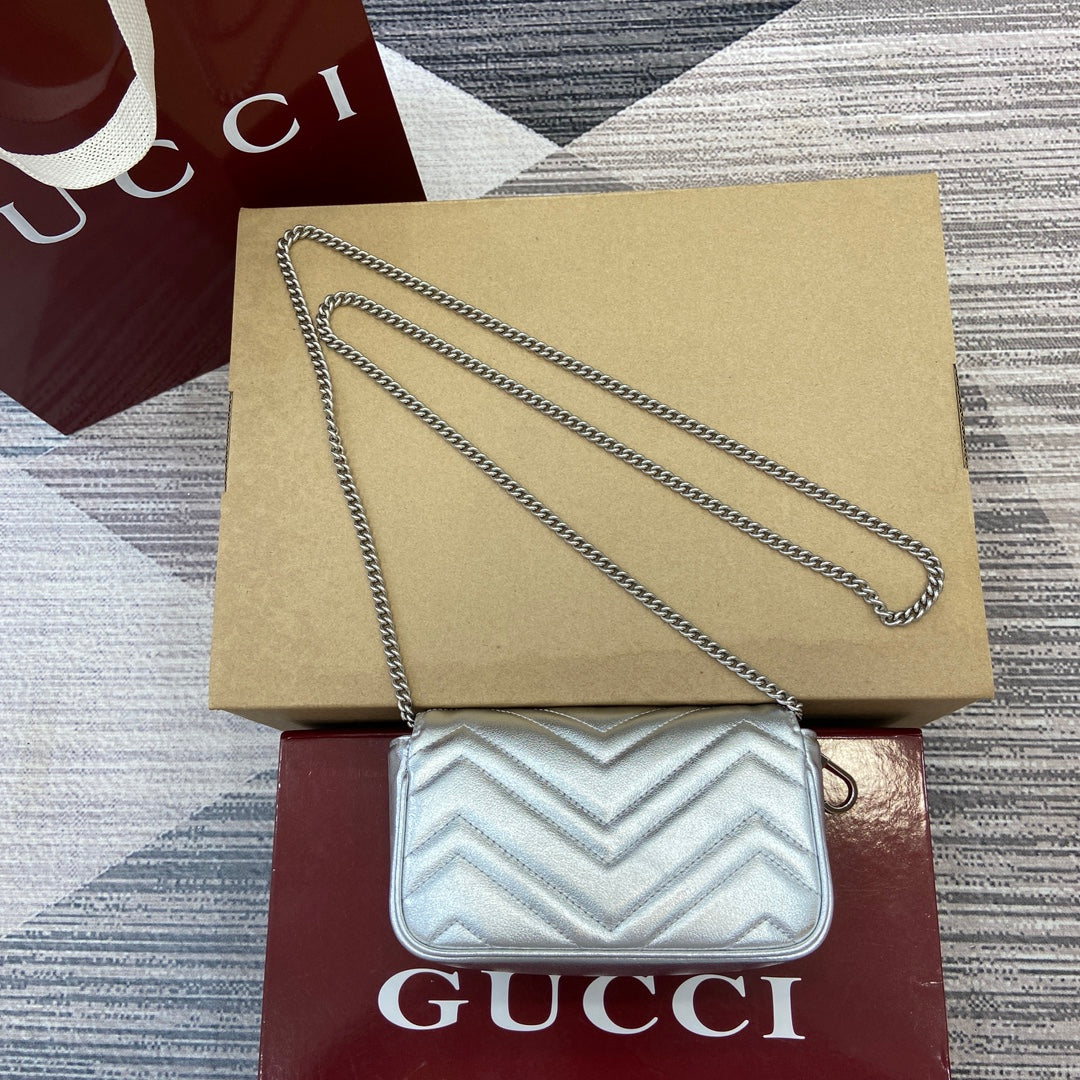 ** Gucci GG Marmont Super Mini Handbag - Silver Metallic Leather

**