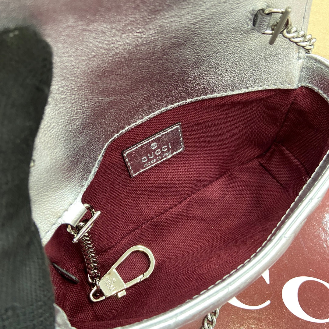 ** Gucci GG Marmont Super Mini Handbag - Silver Metallic Leather

**