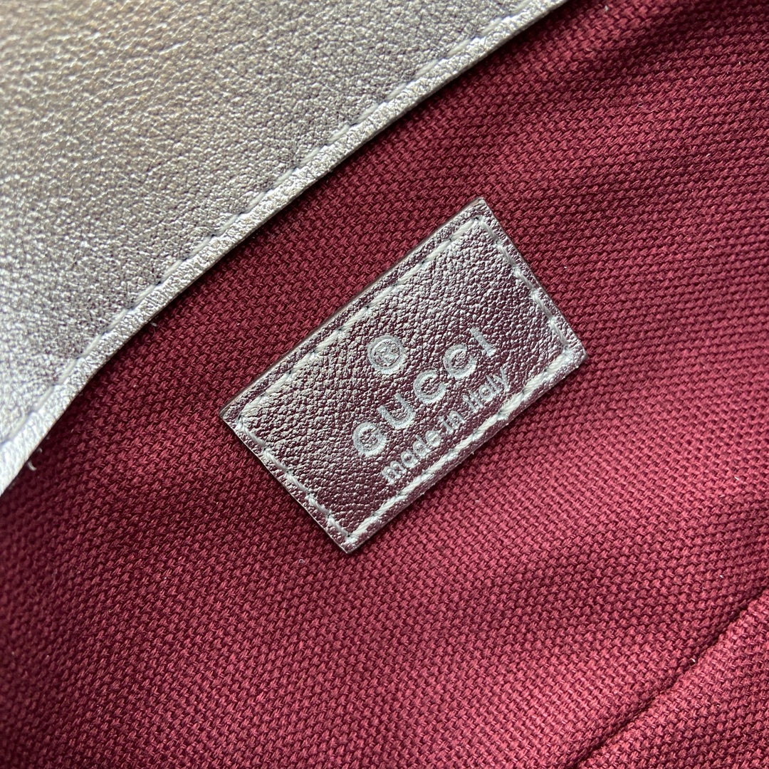 ** Gucci GG Marmont Super Mini Handbag - Silver Metallic Leather

**