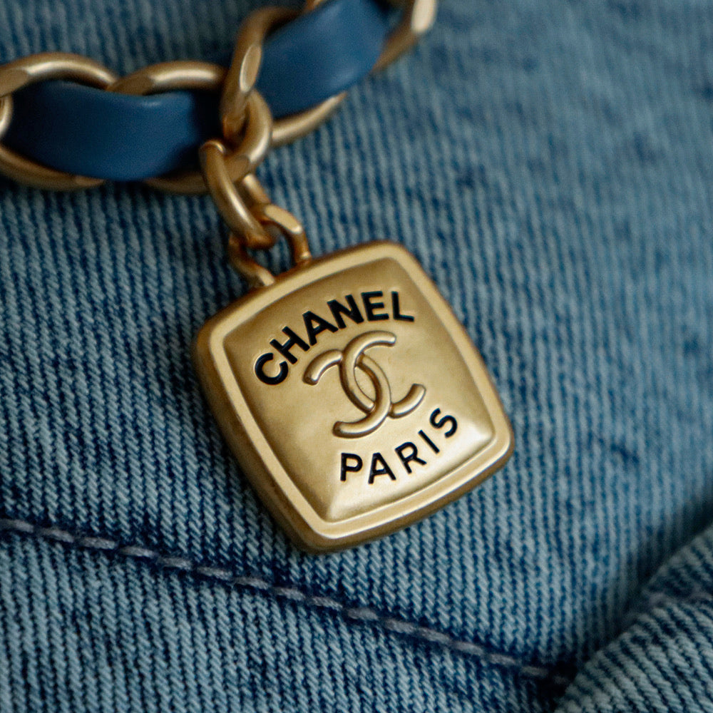 ** Chic Blue Denim Hobo Bag with Classic Pattern

**