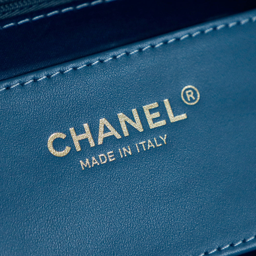 ** Chic Blue Denim Hobo Bag with Classic Pattern

**