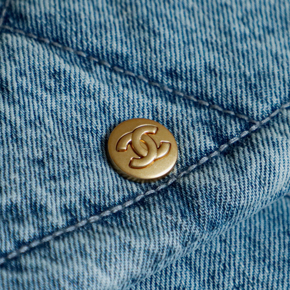 ** Chic Blue Denim Hobo Bag with Classic Pattern

**